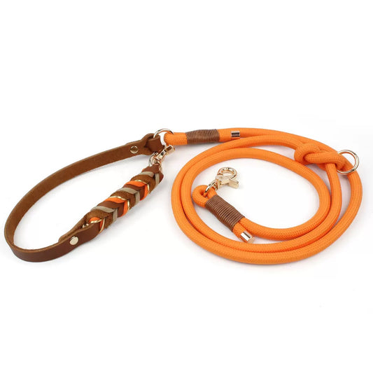 Flat lay view of a 7.2ft 6-in-1 hand-braided Orange Tan dog leash showcasing the durable polyester rope and leather wrap.