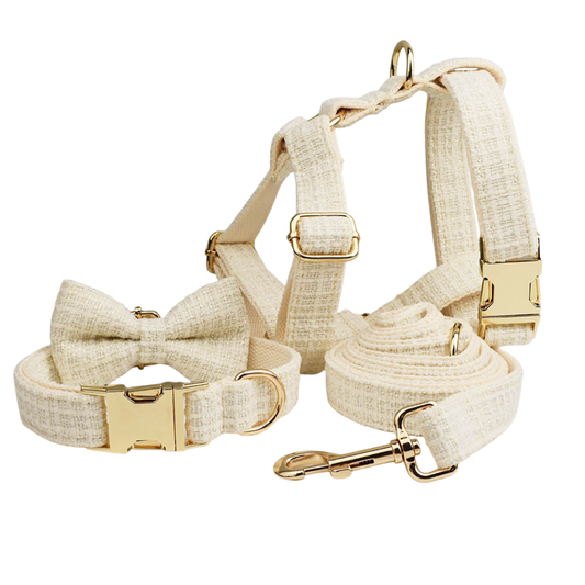 Classic cream tweed dog 4-piece set with detachable bow tie flat lay product shot