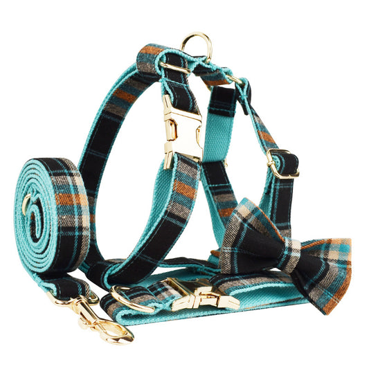 Black teal and orange plaid dog 4-piece set collar bow tie harness leash complete product shot white background

