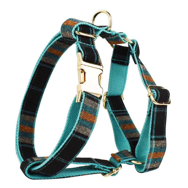 Black teal and orange plaid dog harness with gold hardware detail product shot white background
