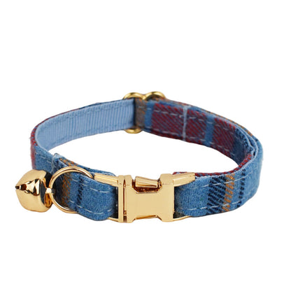 Adjustable blue plaid cat collar featuring a gold-tone buckle, matching bell and soft blue lining