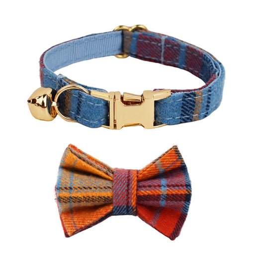 Blue plaid cat collar set with matching detachable bow tie, gold-tone buckle and bell on white background
