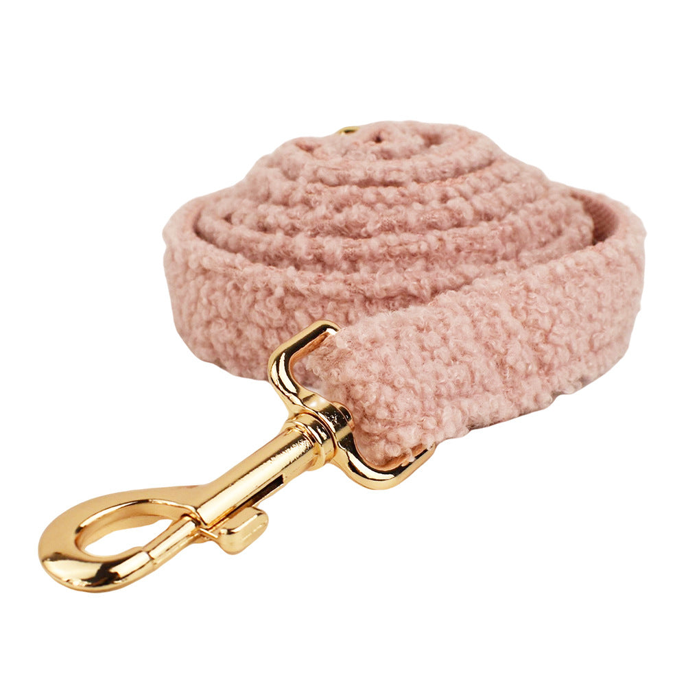 Blush pink teddy fleece dog leash with gold clasp detail product shot white background