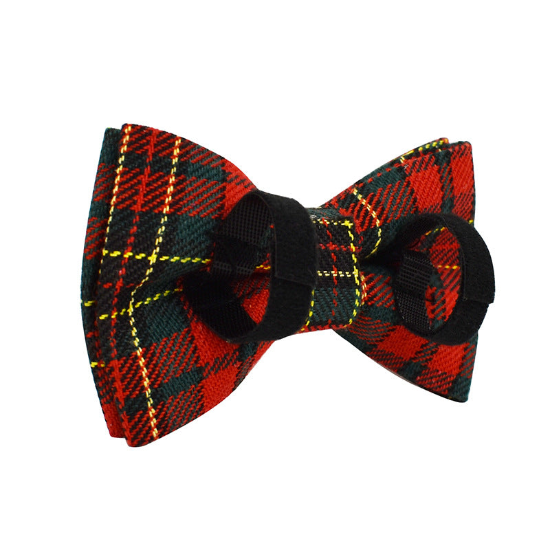 Back view of detachable red and green tartan plaid dog bow tie with black attachment loops