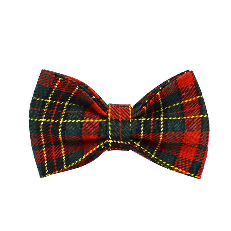 Front view of red and green Christmas tartan plaid detachable dog bow tie