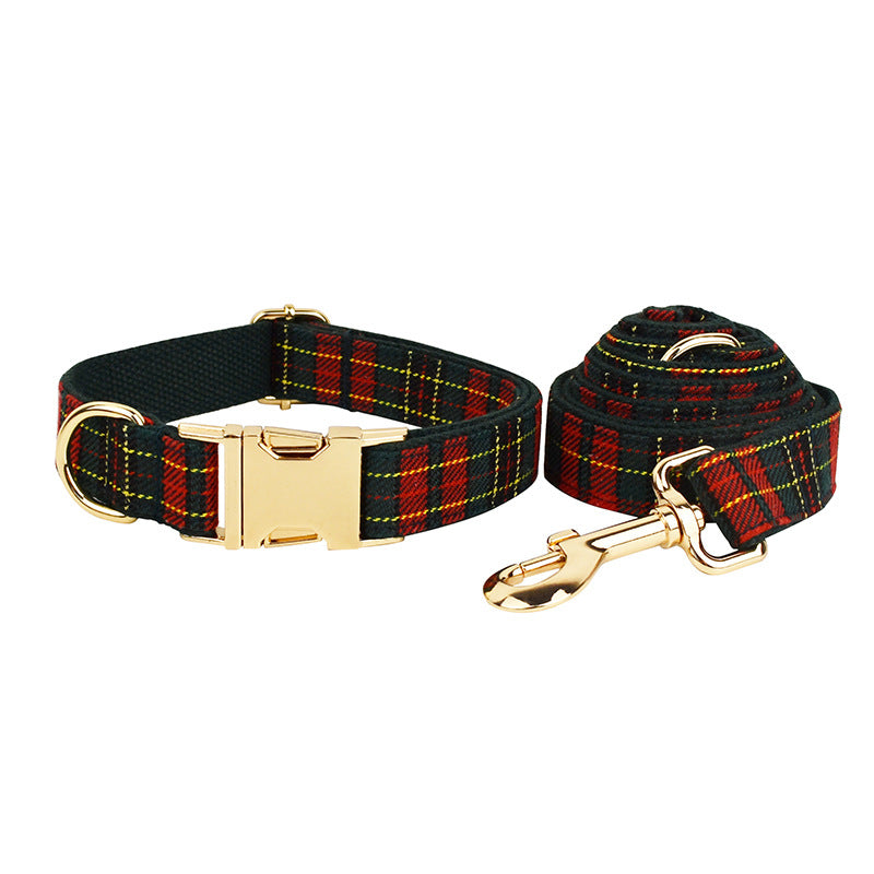 Red and green tartan plaid dog collar and matching leash featuring gold-tone hardware