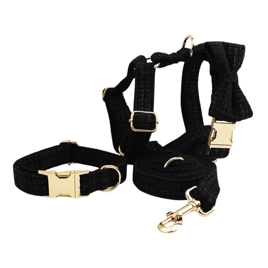 Classic black tweed dog 4-piece set collar bow tie harness leash with gold hardware main product shot 