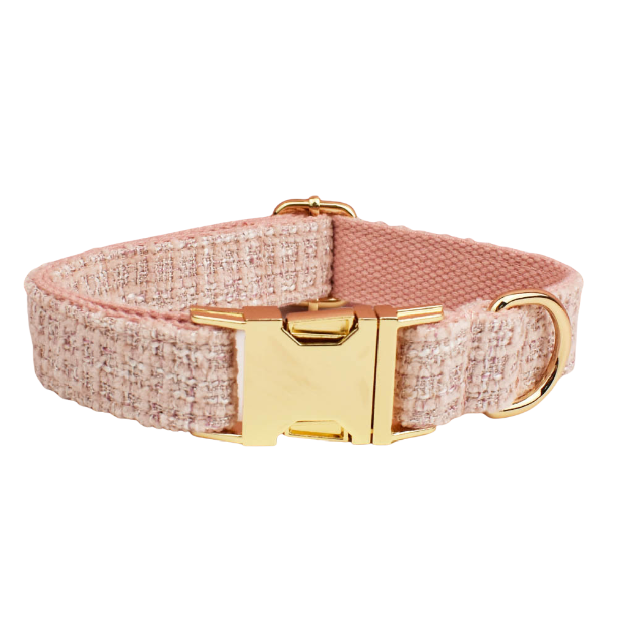 Front view of a Bling Fuzzie blush pink tweed dog collar showing the gold brass side-release buckle and D-ring, with soft woven tweed texture and pink canvas lining on a white background