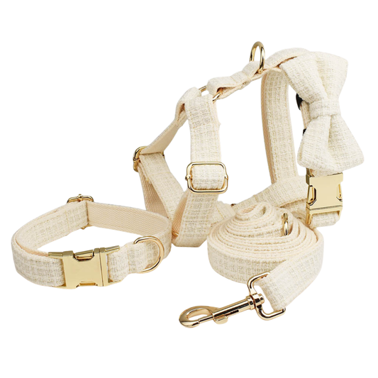 Classic cream tweed dog 4-piece set collar bow tie harness leash with gold hardware main product shot