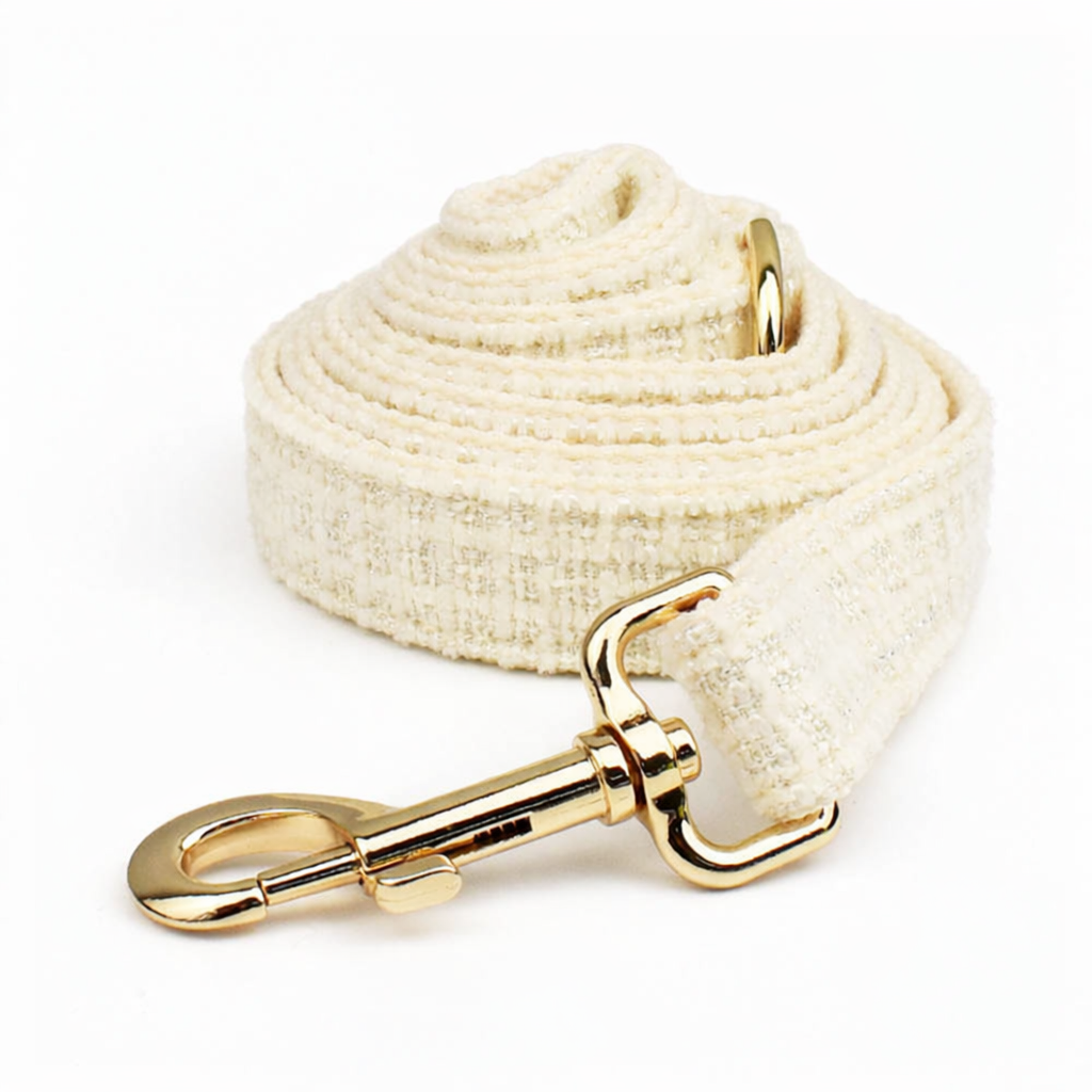 Classic cream tweed dog leash with gold hardware clasp detail shot