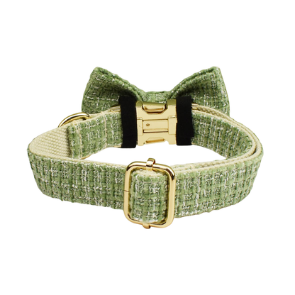 Back view of a Bling Fuzzie sage green tweed dog collar with detachable bow tie, showing the adjustable gold brass buckle and D-ring hardware on a white background