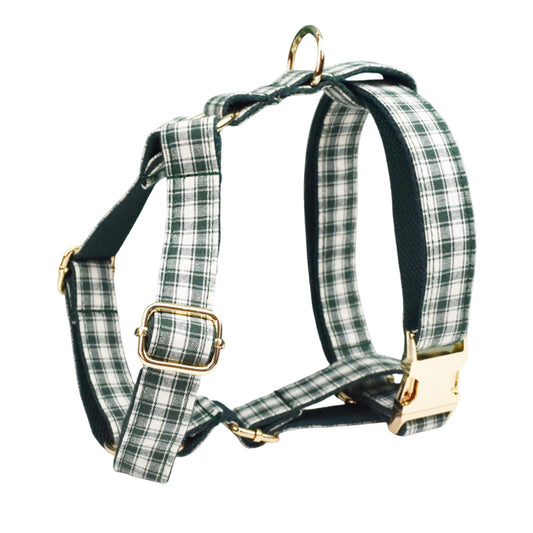 Adjustable forest green and cream plaid dog harness with gold-tone buckles and dark green lining