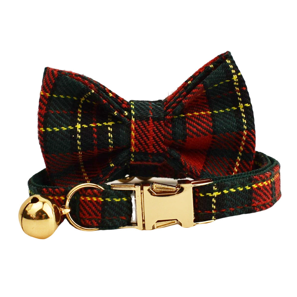 Forest green tartan cat collar set with matching detachable bow tie, gold-tone buckle and bell on white background