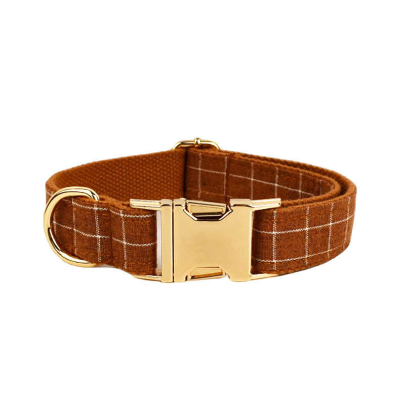 Adjustable gingerbread brown plaid dog collar with white checks and gold-tone buckle