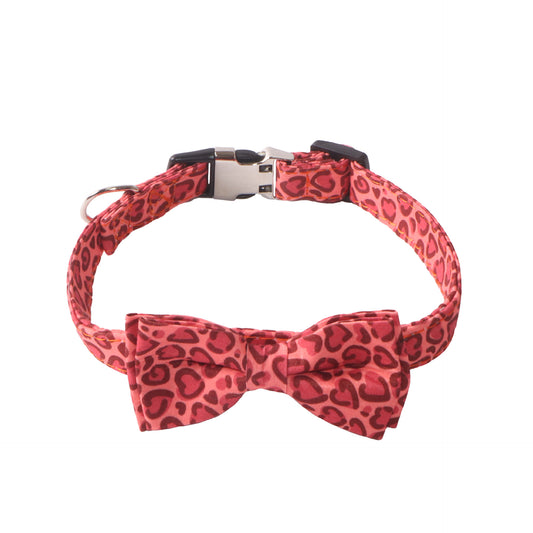 Ruby red leopard heart print dog collar with removable bow tie and metal safety buckle on white background - stylish pet accessory