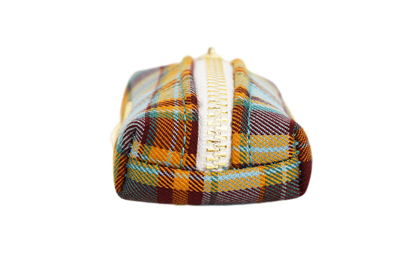 Teal and mustard plaid dog poop bag holder with zip front product shot white background

